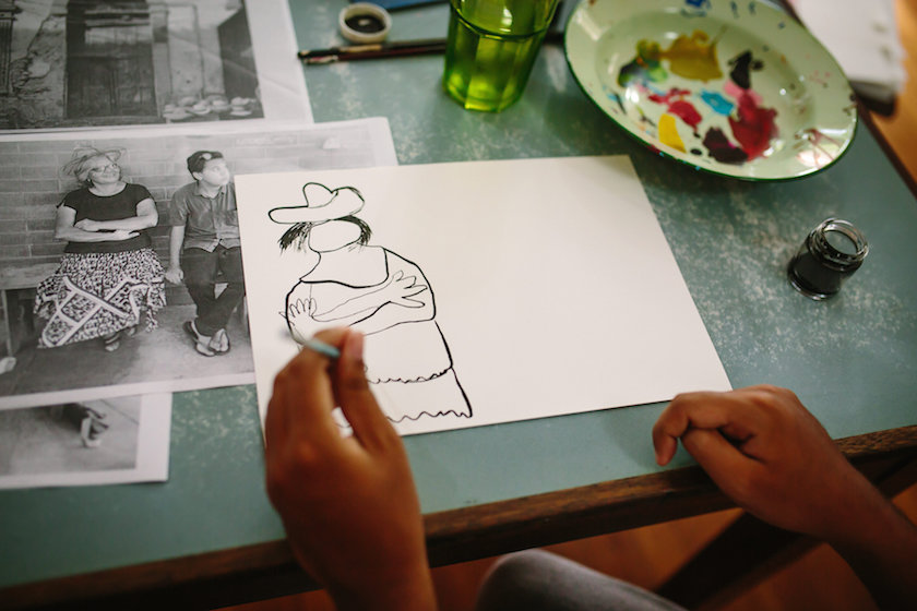 Joshua working with ink.