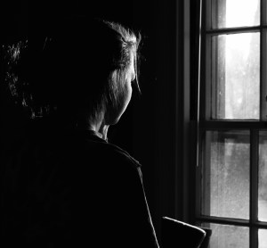 Girl looking out window. Photo from pexels.com