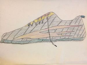 A sneaker with a red flame along the side 