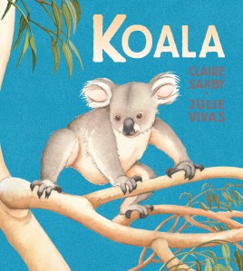Koala by Claire Saxby and Julie Vivas. Image: picture book with blue sky background and an illustration of a koala in the crook of a gumtree branch. 