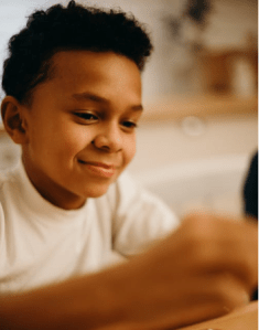 Child building something by hand. Photo from pexels.com