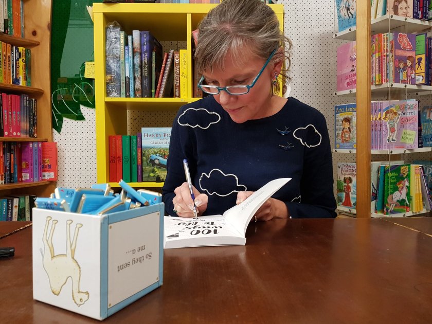 Michelle Taylor signing copies of 100 Ways to Fly.