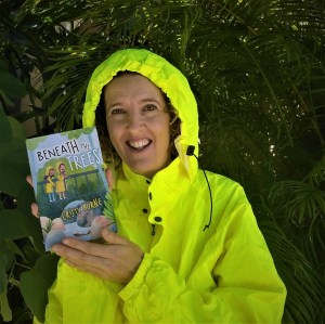 Cristy Burne holds Beneath The Trees 