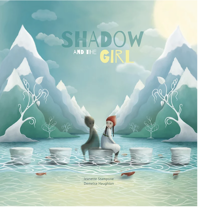 Shadow and the Girl by Jeanette Stampone and Demelsa Haughton. The cover illustration shows a girl with plaits, wearing a white dress and a red cap, sitting back to back with a shadowy figure. They both have their feet in water. Behind them are alpine-looking mountains with snow on their peaks.