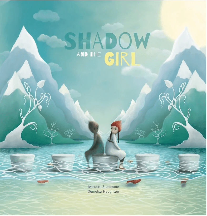 Shadow and the Girl by Jeanette Stampone and Demelsa Haughton. The cover illustration shows a girl with plaits, wearing a white dress and a red cap, sitting back to back with a shadowy figure. They both have their feet in water. Behind them are alpine-looking mountains with snow on their peaks.