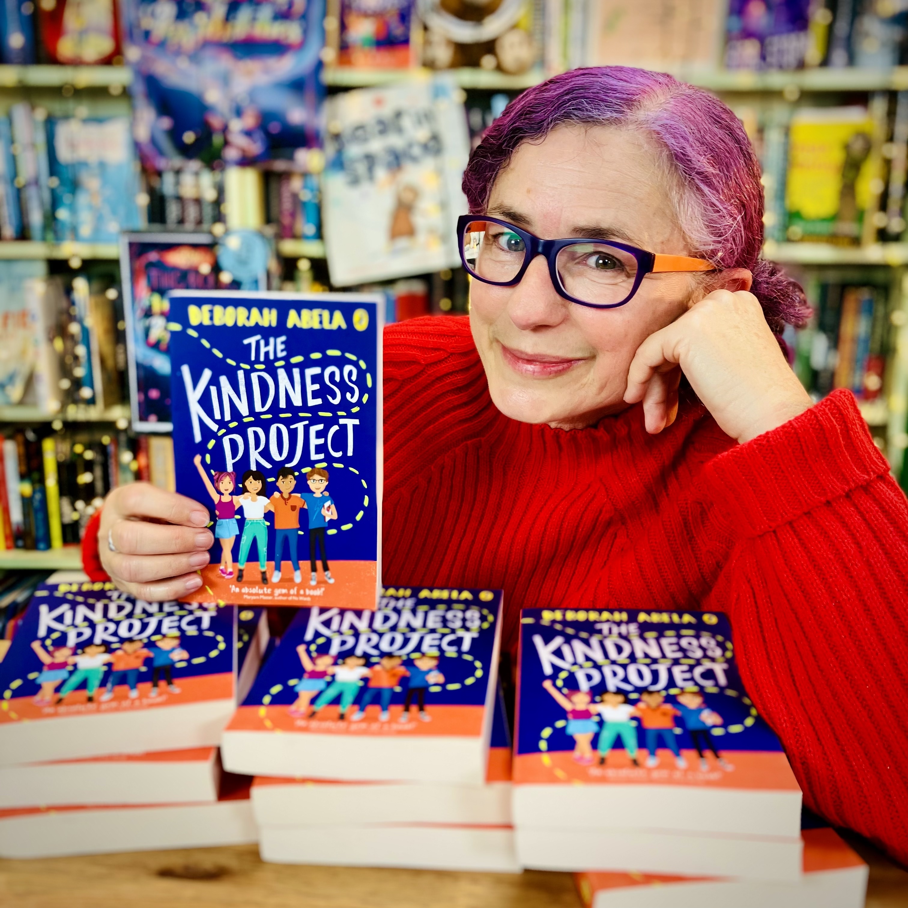 Deborah Abela with copies of The Kindness Project