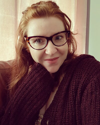 A head and shoulders photo of Kitty Black. 